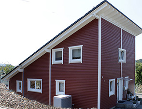 Wohnblockhaus und Holzrahmenhaus
