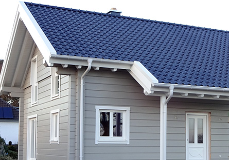 Wohnblockhaus und Holzrahmenhaus