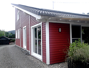 Wohnblockhaus und Holzrahmenhaus